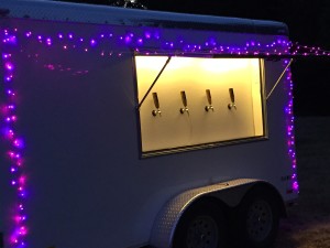 Pink and purple lights on the keg trailer
